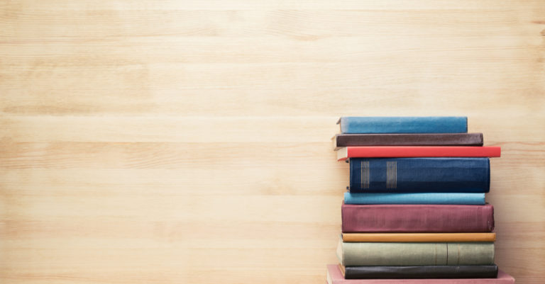 Buyers guide represented by stack of books