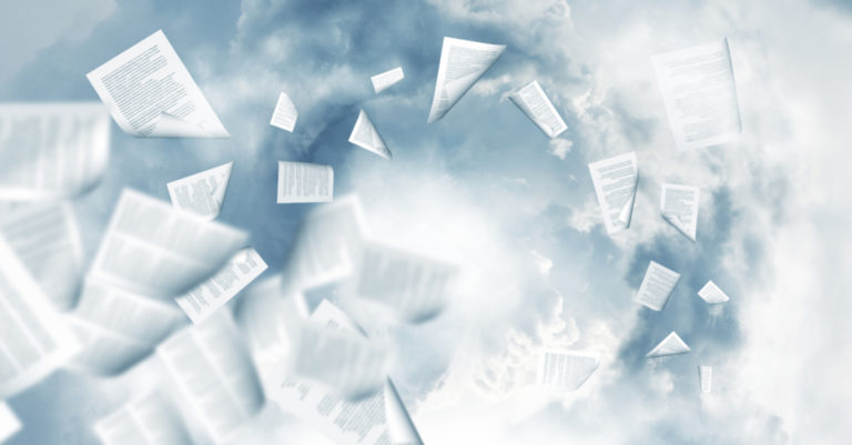 Contract mismanagement represented by papers flying in a storm