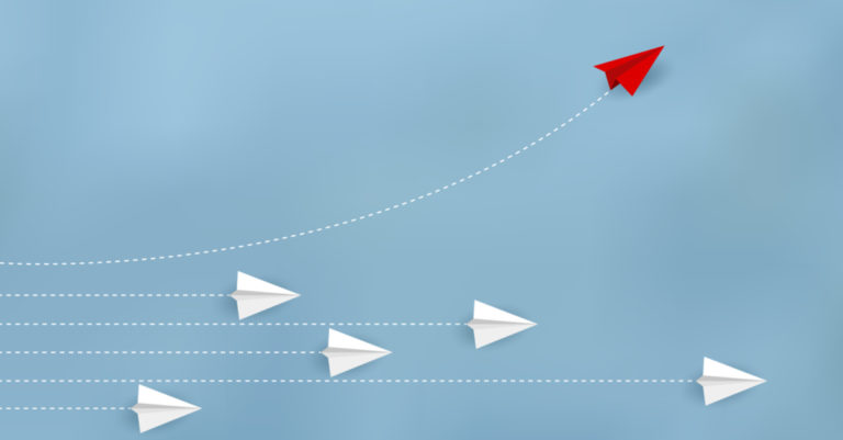 Change management growth represented by paper airplanes going up