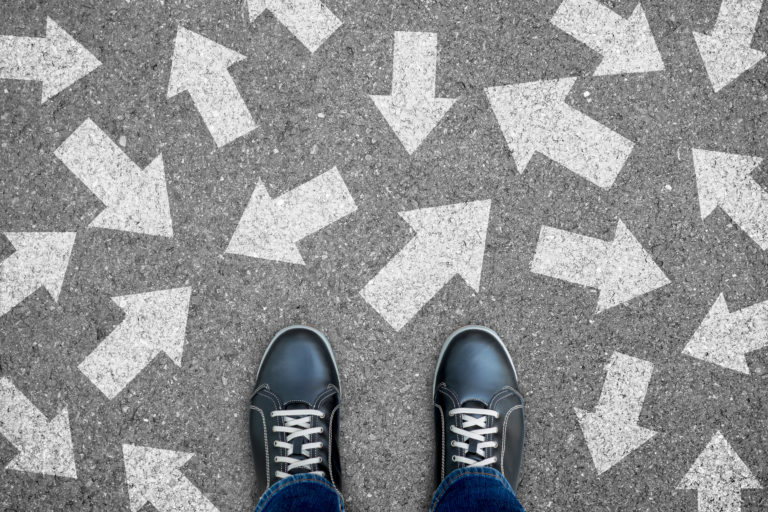 Mens Shoes on Pavement with White Chalk Arrows: Deciding on Electronic Signature Solutions