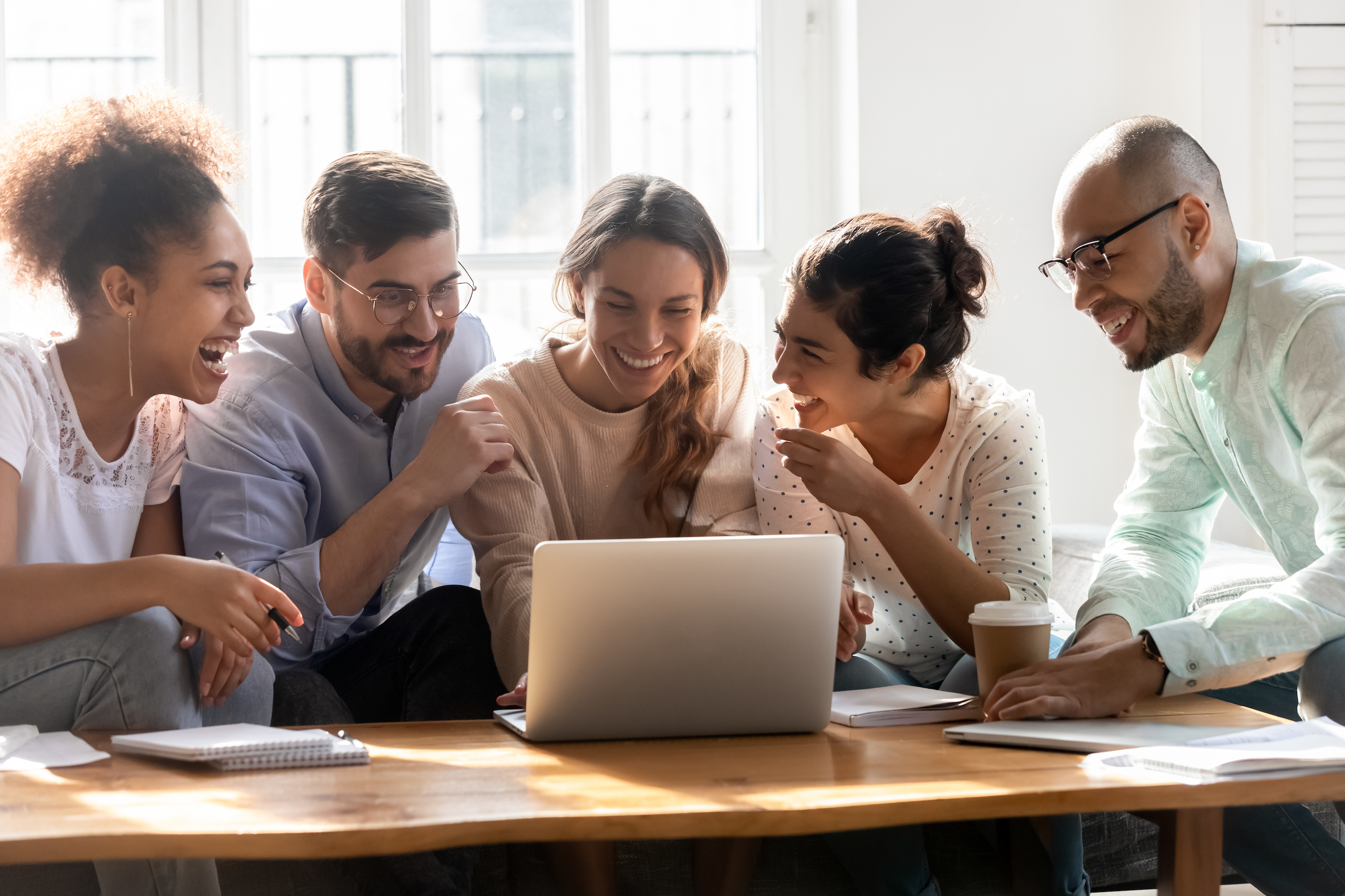 Deciding on Contract Management Software in 2020 team of 5 professionals in a discussion