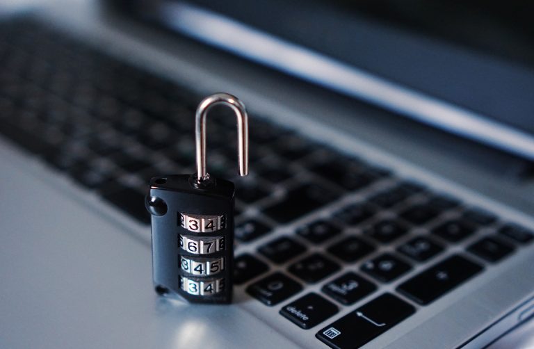 Laptop with lock place on it for Document Security Must Have Checklist for Your Remote Team
